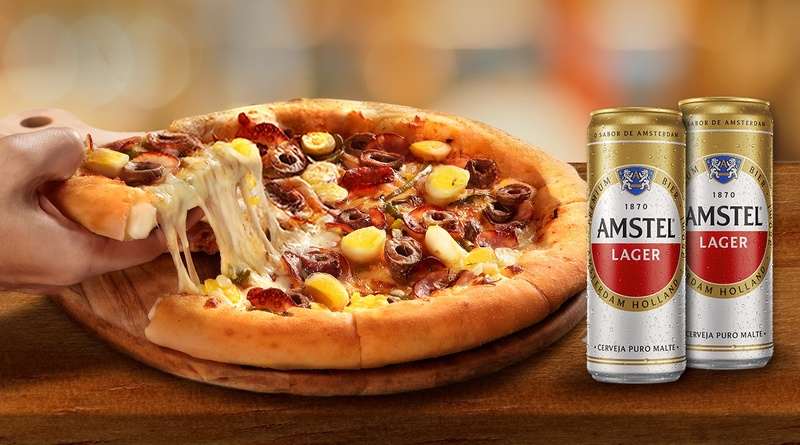 Domino’s oferece Amstel em dobro em ação especial de abril