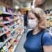 Pandemia: Coronavirus And Retail Concept, Young Woman Wearing Medical Mask